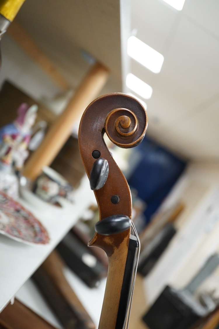 A mid 20th century cased Czech viola 15.25” body, with a fully mounted octagonal bow with plastic tip plate
